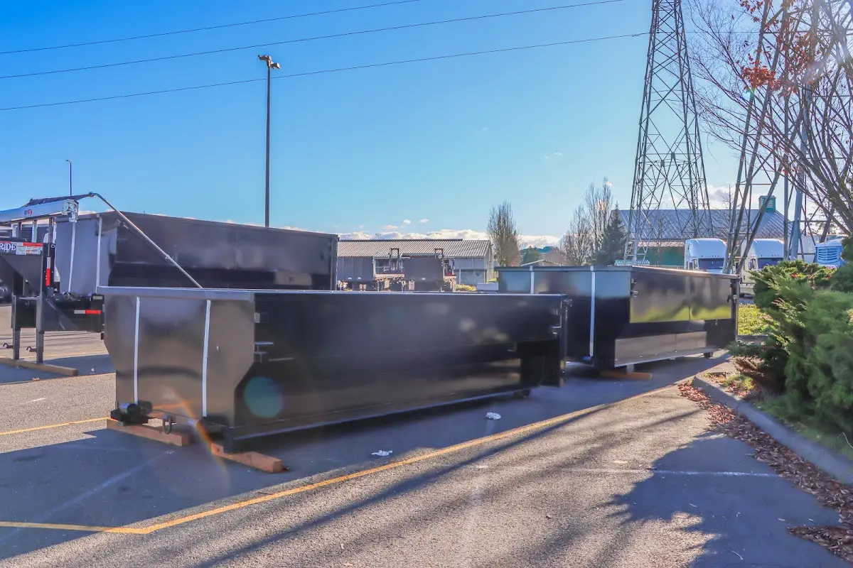 Roll-off dumpster ready for waste disposal at job site for 15 Yard Dumpster Rental in Seabrook